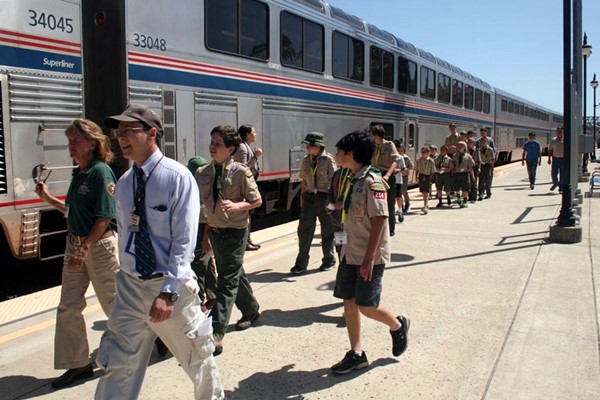 photo of scouts getting on train